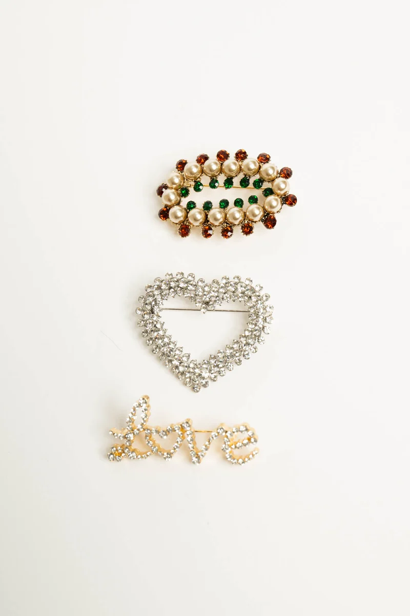 Set da tre spille con strass multicolor