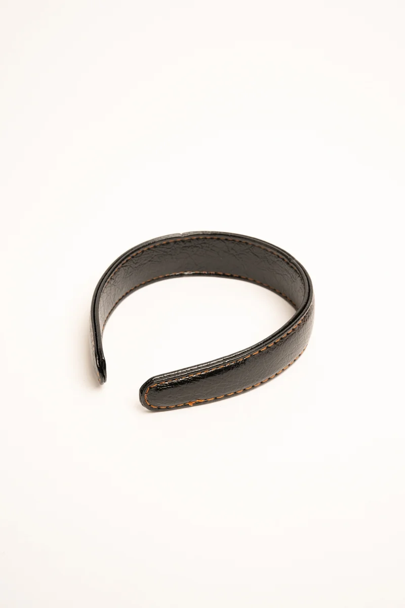 Cerchietto in similpelle nera