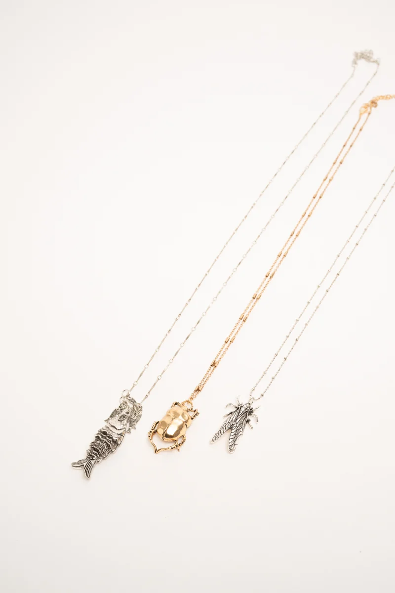 Set di tre collane con ciondoli Scarabeo oro e argento