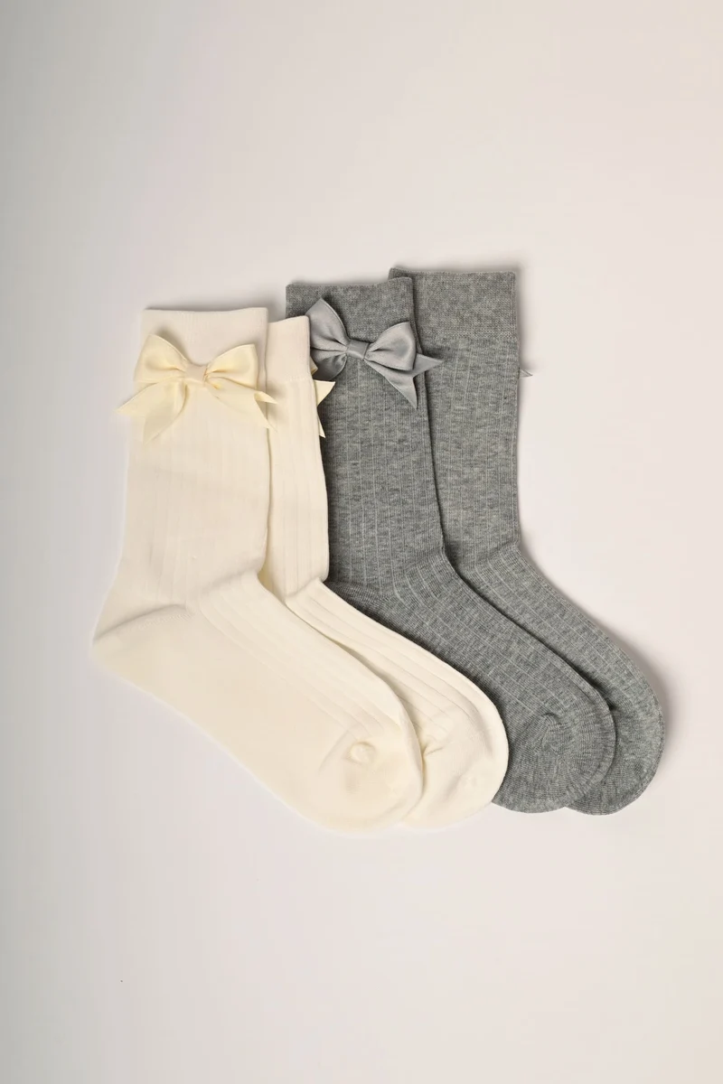 Set da due paia di calzini con fiocchetti