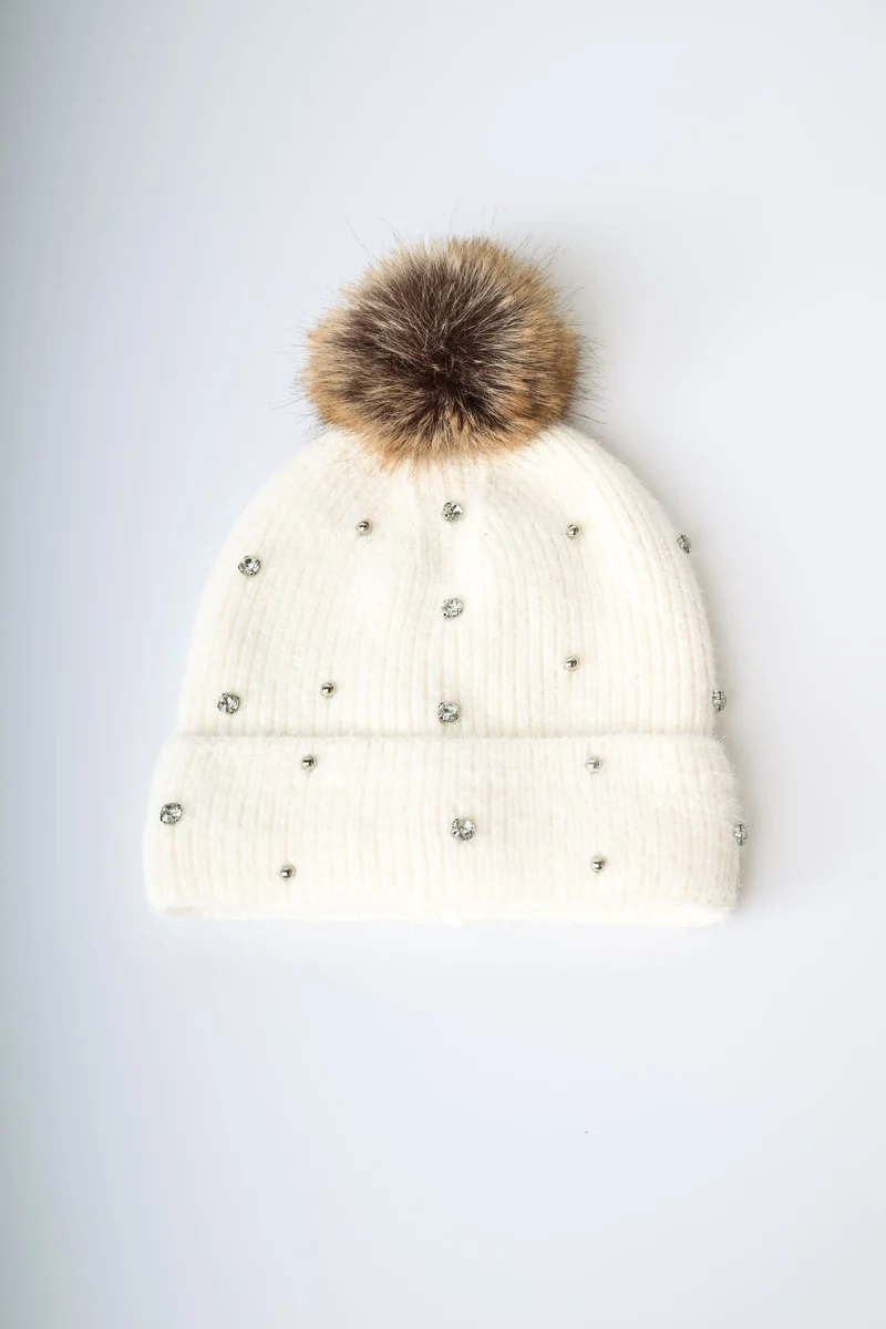 Berretto con pompon e strass