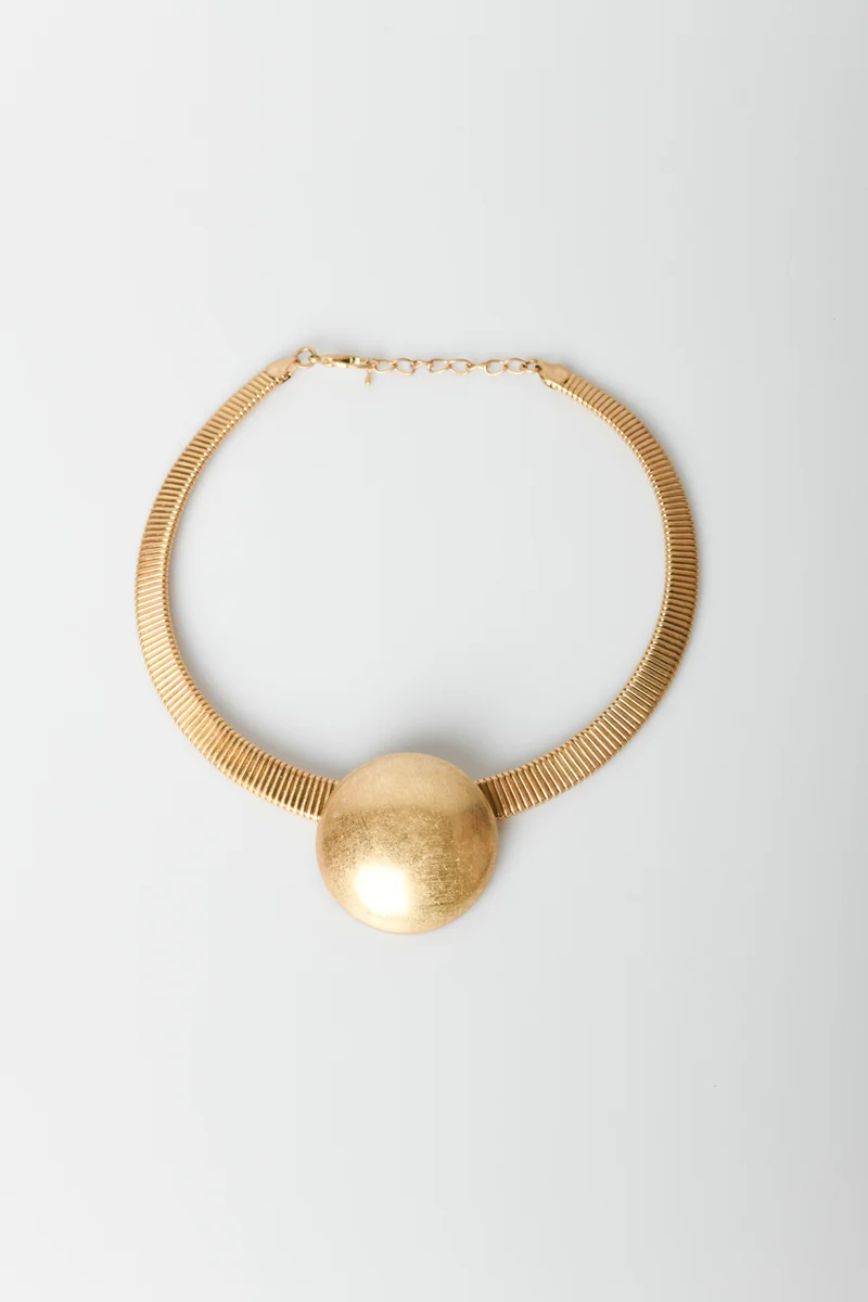 Collana rigida con pendente